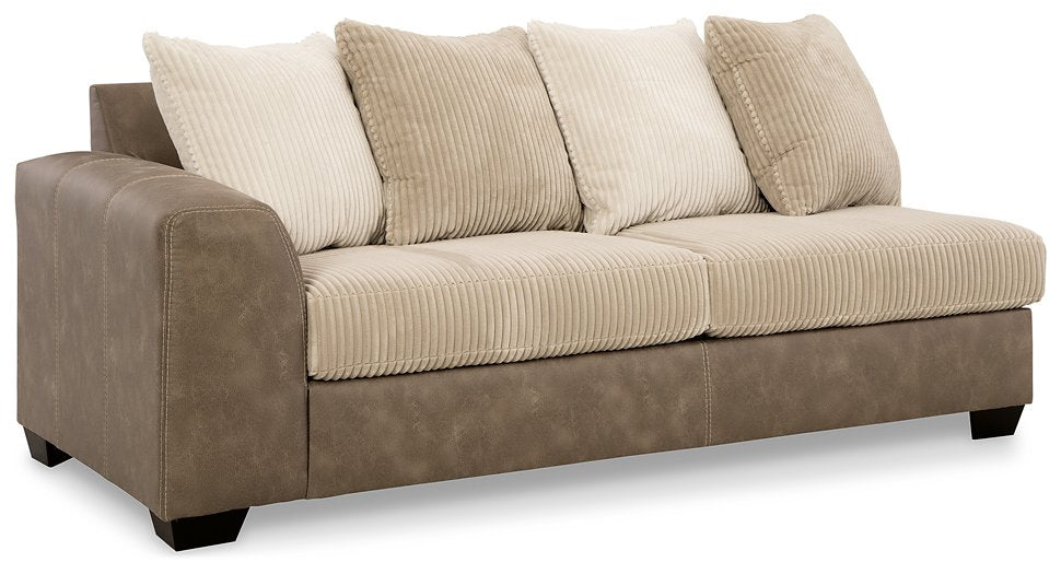 Keskin 2-Piece Sectional with Chaise - Yulissa Home Furnishings (NJ)