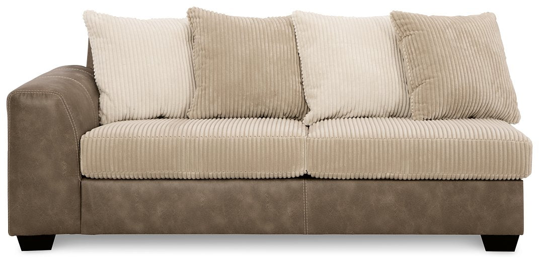 Keskin 2-Piece Sectional with Chaise - Yulissa Home Furnishings (NJ)