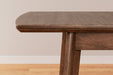 Lyncott Dining Extension Table - Yulissa Home Furnishings (NJ)