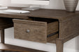 Janismore Home Office Storage Leg Desk - Yulissa Home Furnishings (NJ)