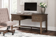 Janismore Home Office Storage Leg Desk - Yulissa Home Furnishings (NJ)