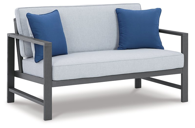 Fynnegan Outdoor Loveseat with Table (Set of 2) - Yulissa Home Furnishings (NJ)