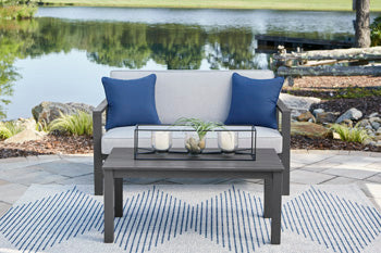 Fynnegan Outdoor Loveseat with Table (Set of 2) - Yulissa Home Furnishings (NJ)