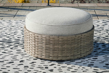 Calworth Outdoor Ottoman with Cushion - Yulissa Home Furnishings (NJ)