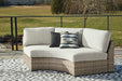 Calworth Outdoor Curved Loveseat with Cushion - Yulissa Home Furnishings (NJ)