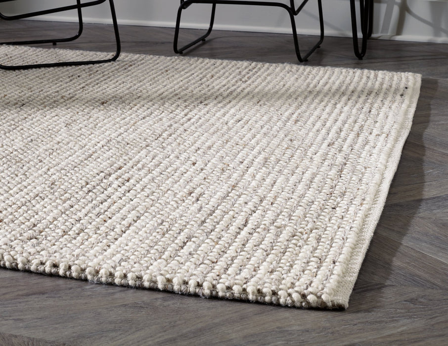 Jossick 7'8" x 10' Rug - Yulissa Home Furnishings (NJ)