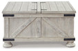 Carynhurst Coffee Table - Yulissa Home Furnishings (NJ)