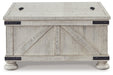 Carynhurst Coffee Table - Yulissa Home Furnishings (NJ)