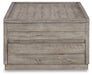 Naydell Lift Top Coffee Table - Yulissa Home Furnishings (NJ)